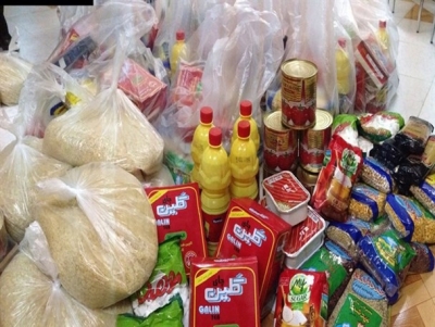 ۱۰۰ بسته غذایی بین نیازمندان شهرستان هیرمند توزیع شد